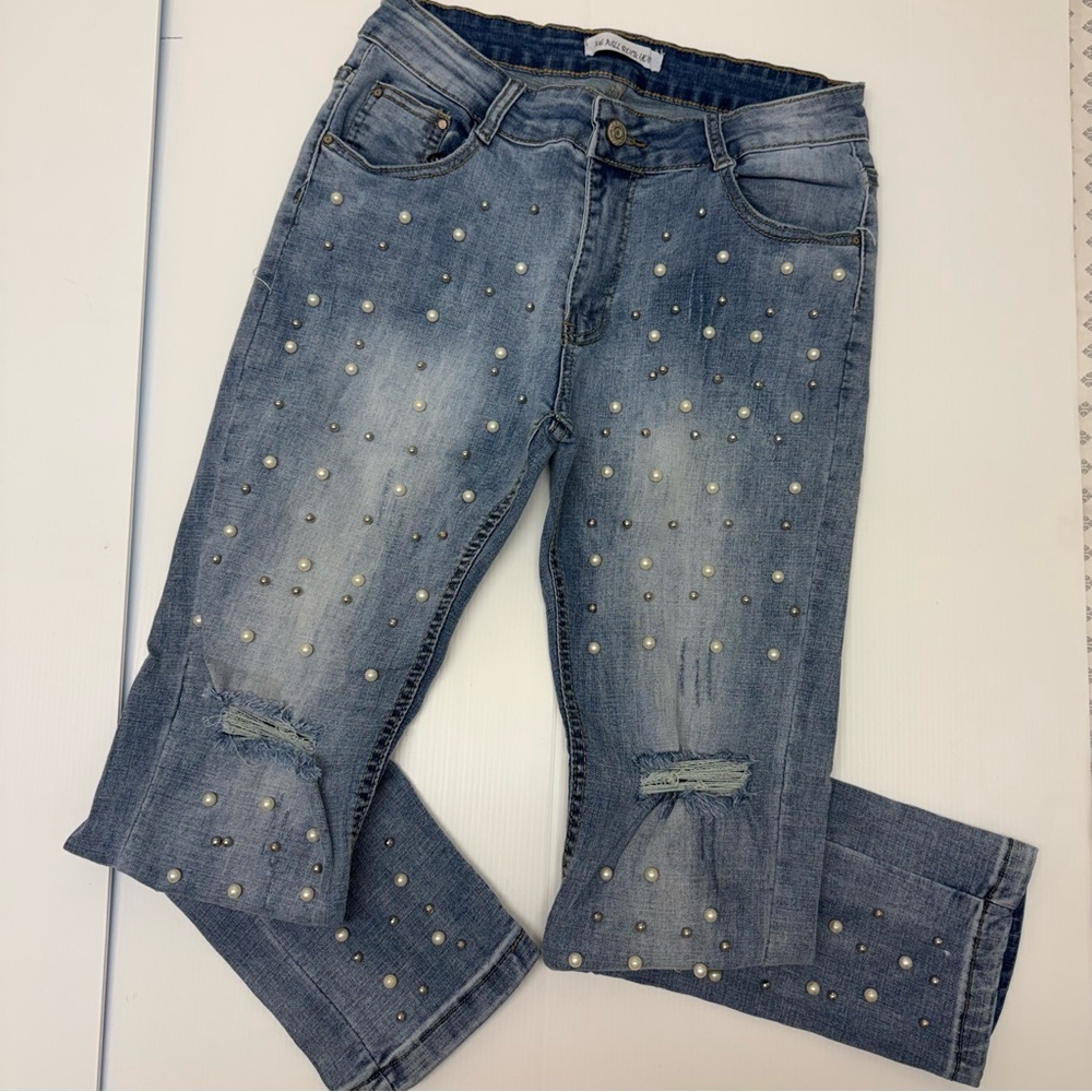 P109- Elegant Women's Light Blue Jeans with Pearl Details